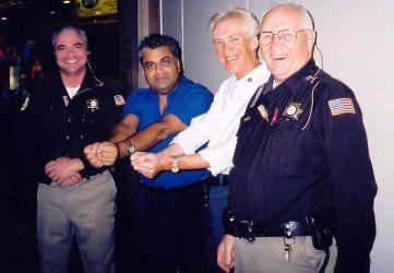 Ali Karim & Ken Bruen Cuffed at Bouchercon 2003!